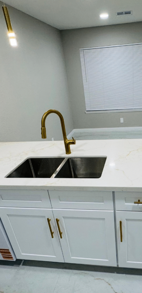 Modern kitchen sink faucet installation in Las Vegas NV with double basin sink