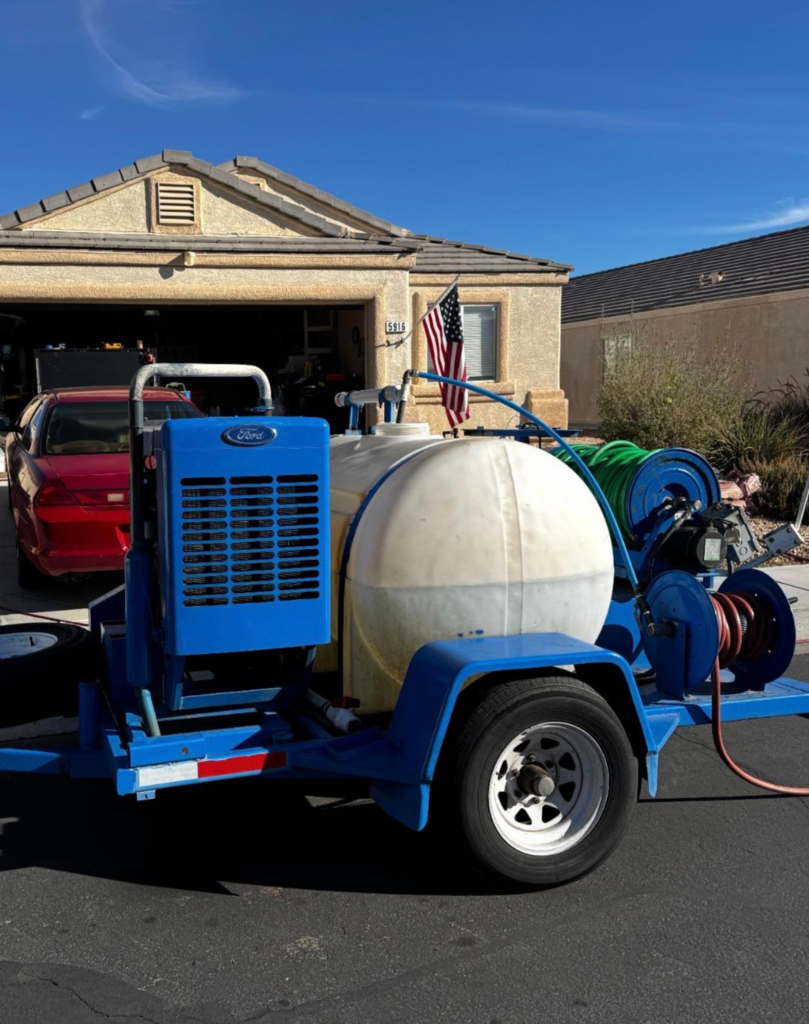 High-powered hydro jetting equipment mounted on trailer outside Las Vegas home