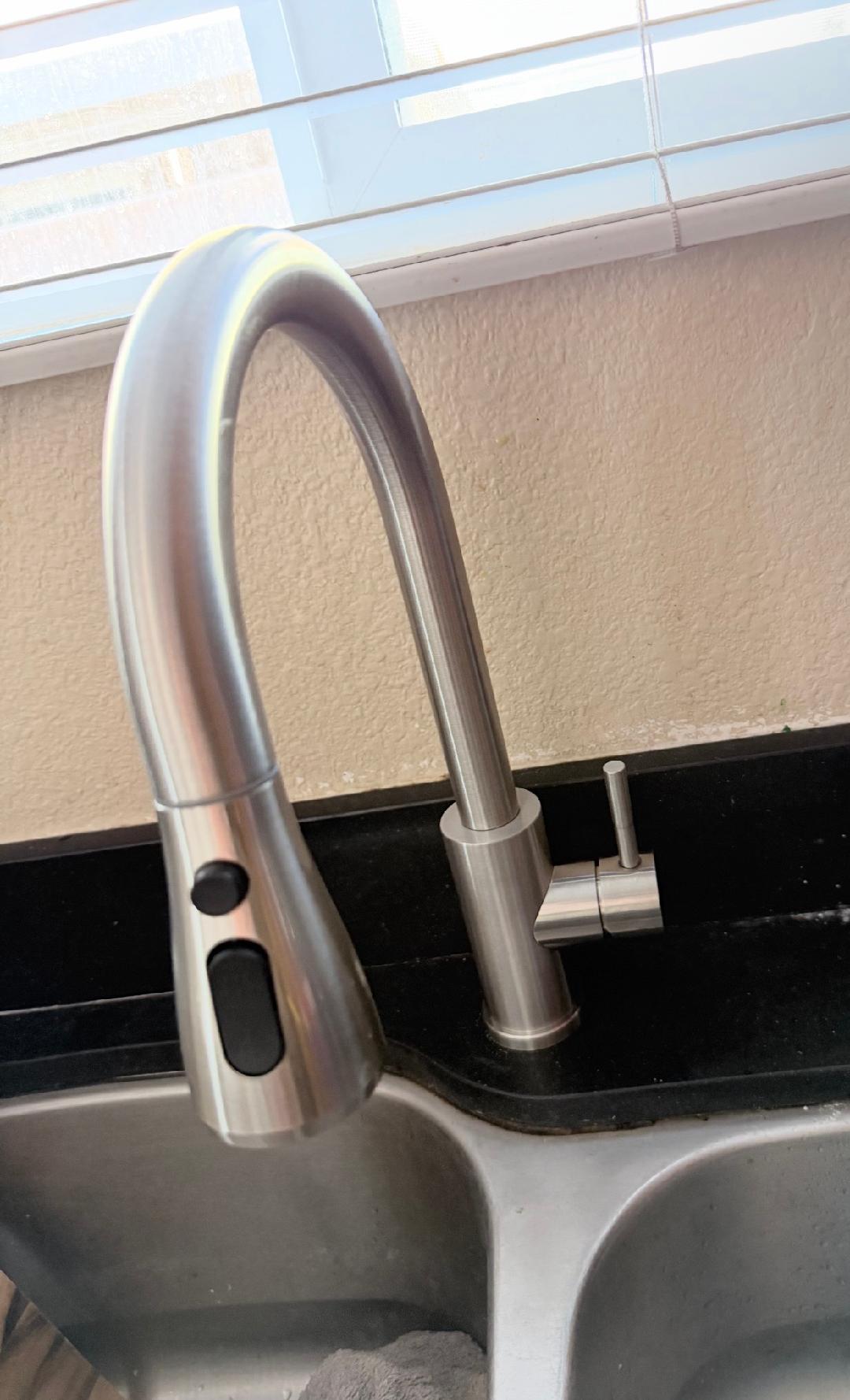 Faucet repair Las Vegas — pull-down kitchen faucet close-up