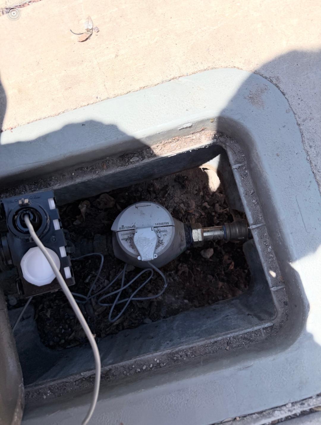 Sensus water meter in underground meter box inspected during slab leak detection service in Las Vegas, NV